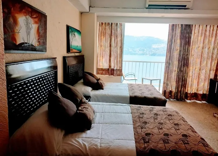 Suite en torres gemelas con vista al mar